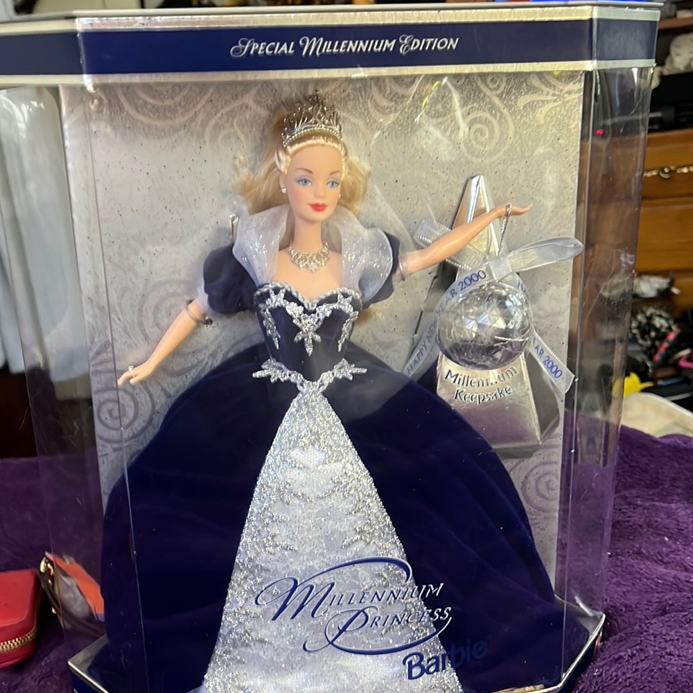 This is a 2000 Millennium Barbie still attached to original box.